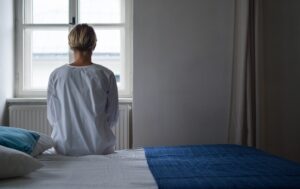 A woman wondering the difference between a psych ward vs mental hospital.