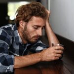 A man wondering the difference between situational depression vs clinical depression.