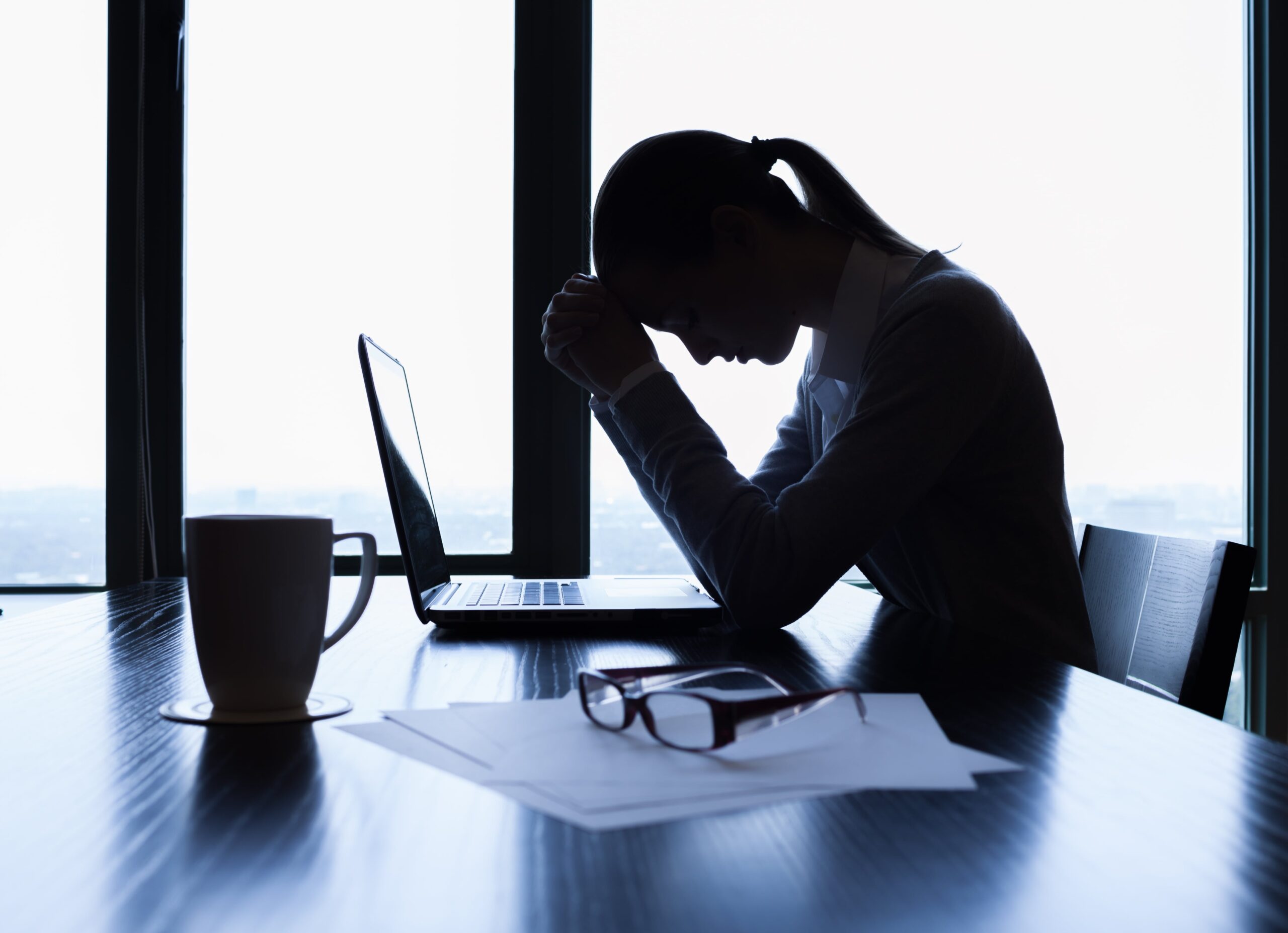 A woman wondering the difference between stress and anxiety.