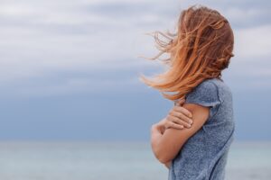 A woman with high-functioning schizophrenia symptoms.