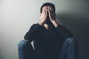 A man with high-functioning schizophrenia symptoms.