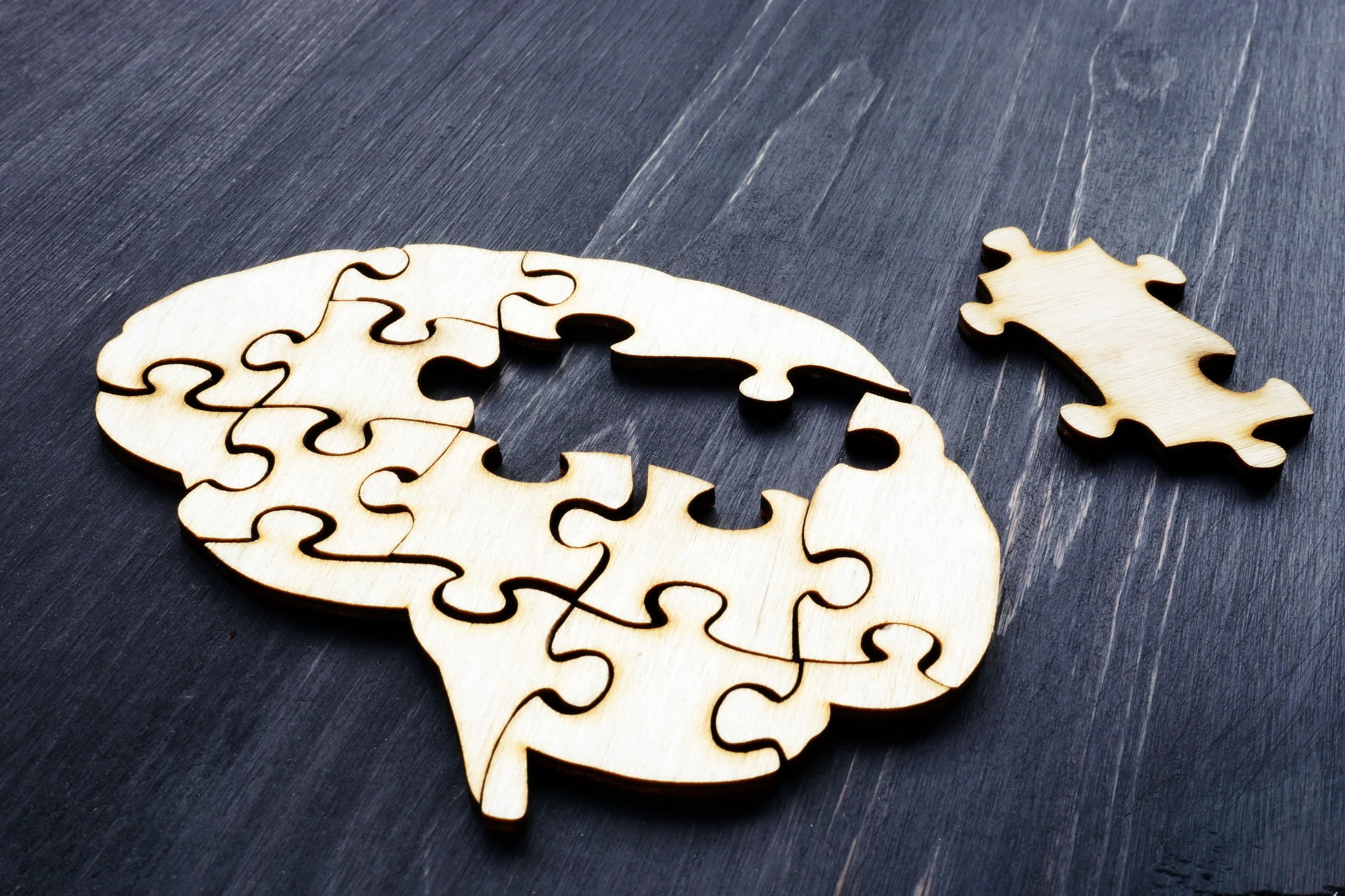 puzzle pieces in the form of a brain with a missing piece depicting borderline vs histrionic